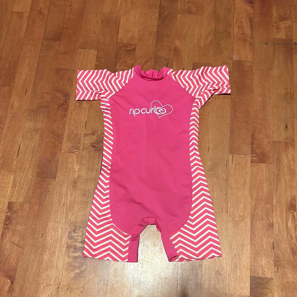 Ripcurl short sleeved sun suit. Size 3 girls .